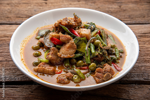 Stir fried pork belly and red curry paste with sting bean. Stir Fried Wild Boar with Red Curry