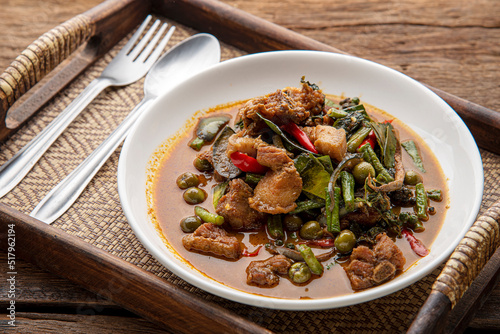 Stir fried pork belly and red curry paste with sting bean. Stir Fried Wild Boar with Red Curry