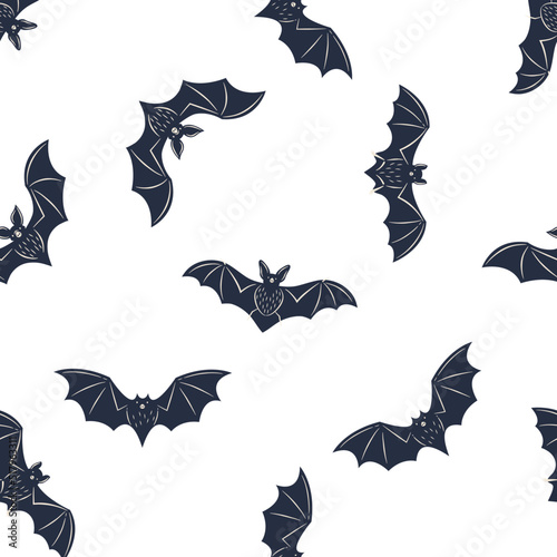 Halloween seamless pattern. Vintage bat's silhouettes isolated on white background. Vector illustration photo