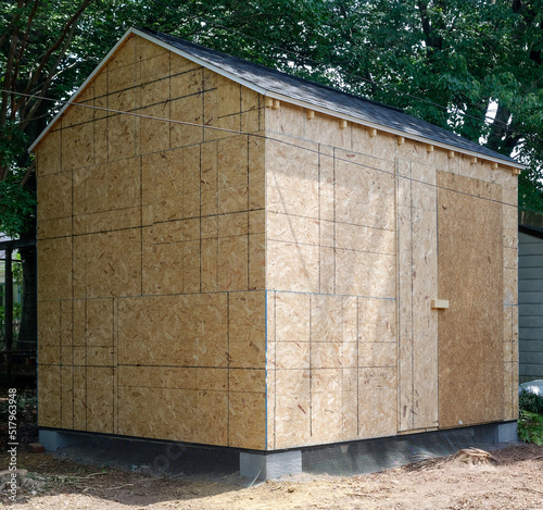 Slika na platnu Newly built wooden utility building.
