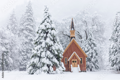 Little brown chapel during a snow storm in Yosemite 