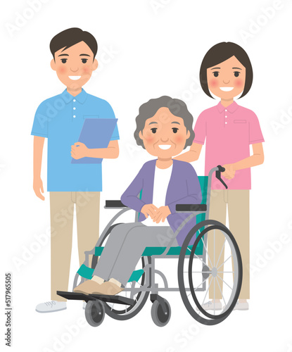 男性と女性の介護士と車椅子に乗ったおばあちゃん