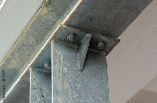 steel beams, detail of a structure built with steel beams joined with bolting to support a staircase for emergency exits in a public building. architecture: