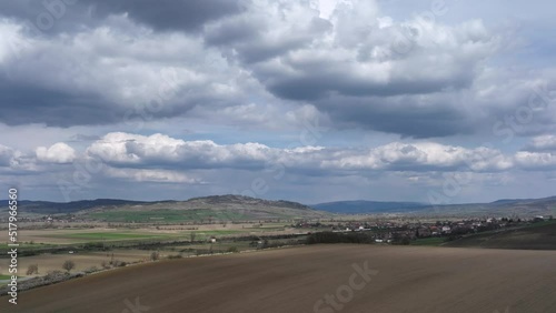 4k Timelapse of Majestic clouds shining through the colorful blue sky