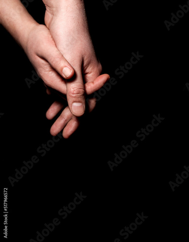 hands of parent and child