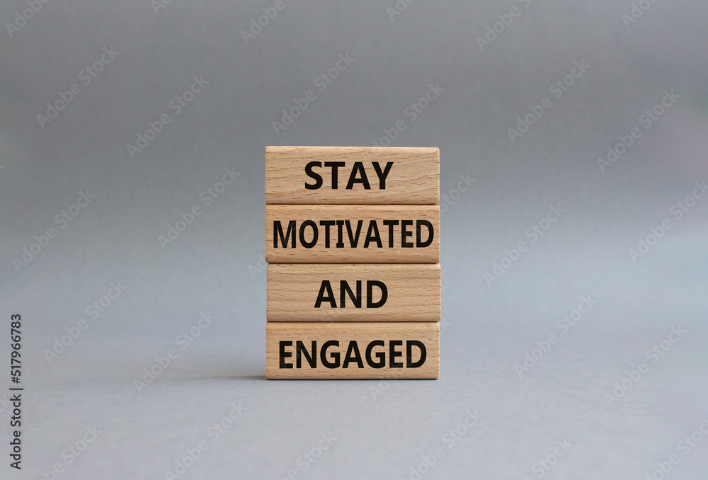 Stay Motivated and Engaged symbol. Concept words Stay Motivated and Engaged on wooden blocks. Beautiful grey background. Business and Stay Motivated and Engaged concept. Copy space Stay Motivated and Engaged symbol. Concept words Stay Motivated and Engaged on wooden blocks. Beautiful grey background. Business and Stay Motivated and Engaged concept. Copy space