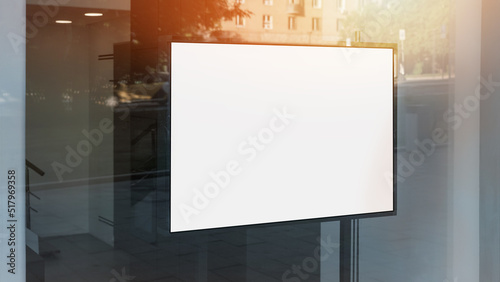 Horizontal blank lightbox with mockup fixed behind window case glass of shop or restaurant