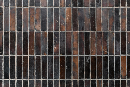 beautiful vertical masonry of brownish ceramic tile with rectangular form