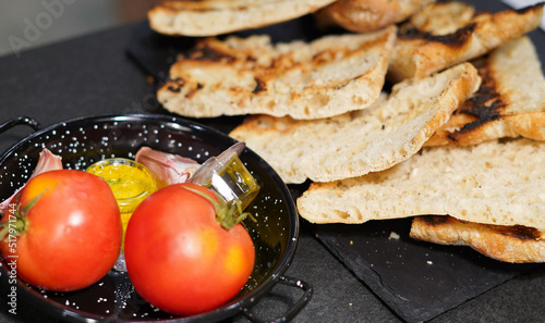 Ración de pan con tomate típica de Cataluña
 photo