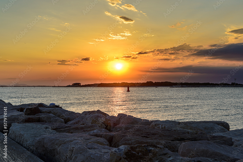 Sunset on the beach of Chioggia in Italy