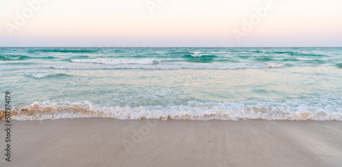 Fototapeta Naklejka Na Ścianę i Meble -  beautiful beach with sea water waves and morning sky