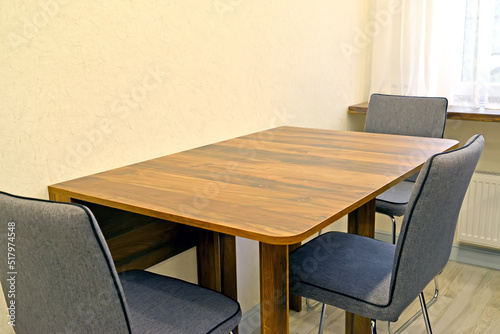 Dining table and upholstered chairs in the kitchen