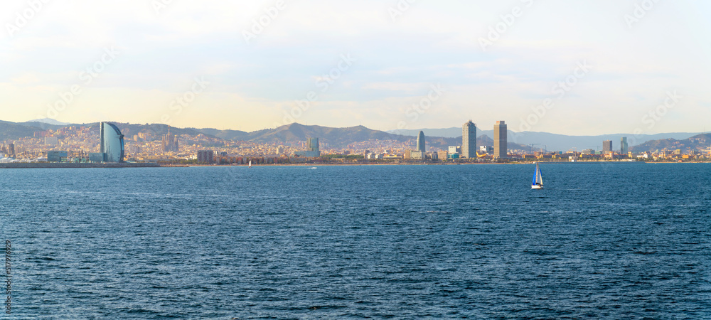 Panoramic view from the sea of the skyline of Barcelona, Spain.
