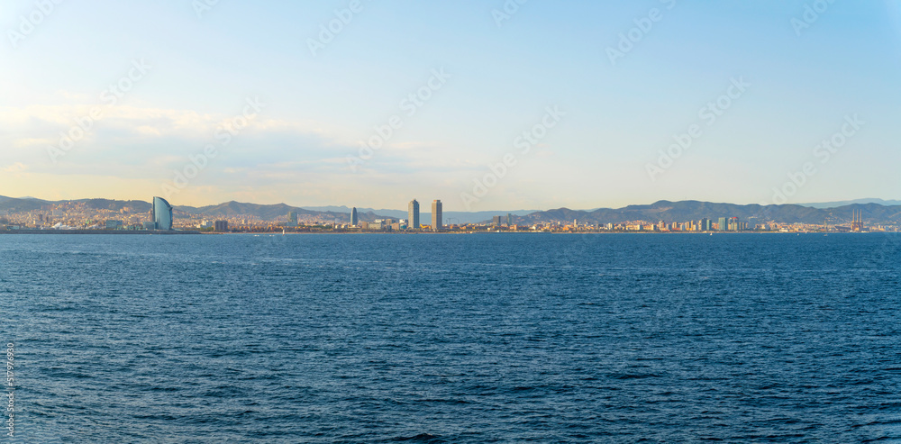 Panoramic view from the sea of the skyline of Barcelona, Spain.