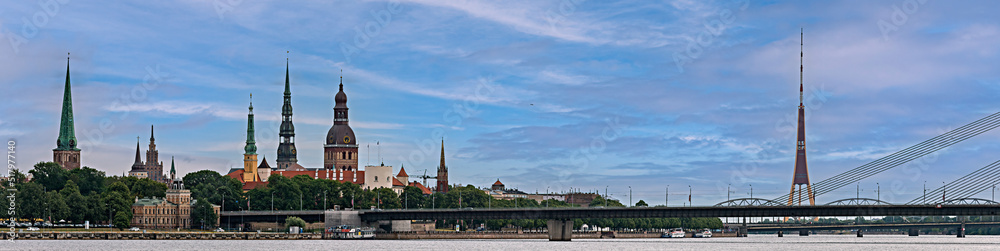 Panoramic image depicting historical district of Riga - the capital city of Latvia, it offers for tourists many resting opportunities and unique medieval and Gothic architecture


