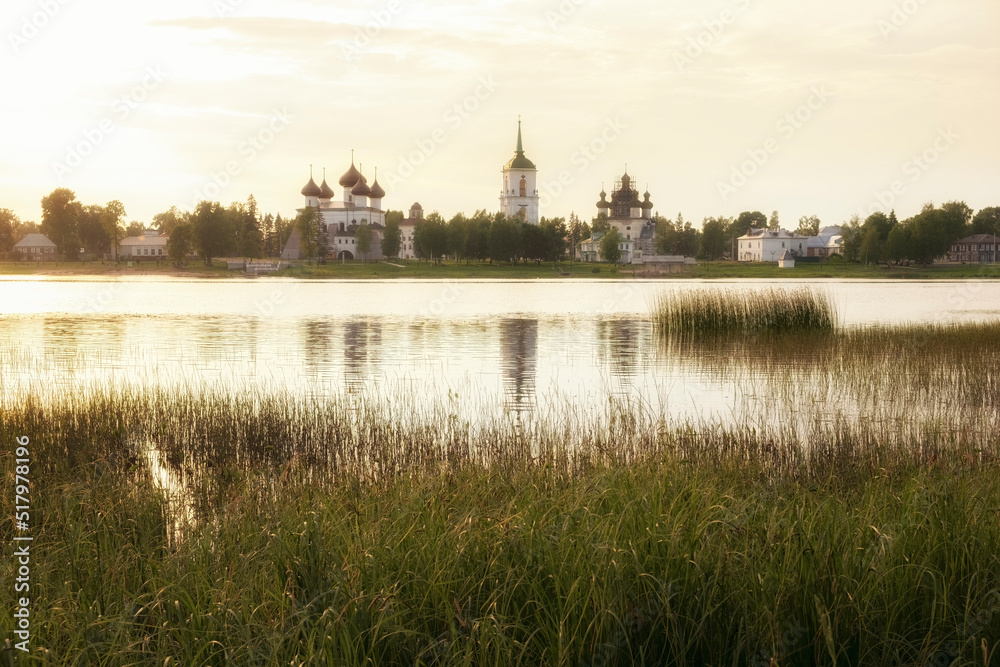 panorama of the city of Kargopol in the Arkhangelsk region with Temples near Onega River at sunset