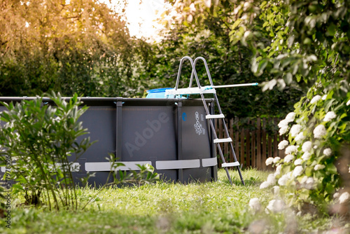 Obraz na plátne Swimming pool with metal frame for home and garden