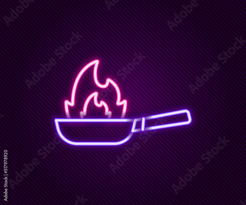Glowing neon line Pan with fire icon isolated on black background. Colorful outline concept. Vector