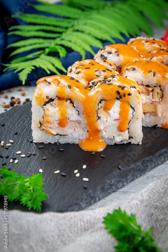 Sushi rolls with eel, crab sauce, ham and crab. Traditional Japanese cuisine