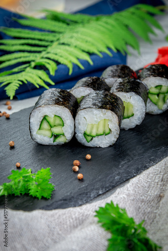 Classic sushi rolls with cucumber. Traditional Japanese Cuisine