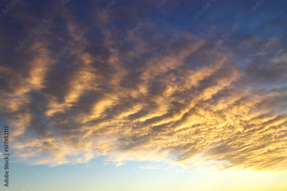 Colorful stratocumulus clouds, at sunset