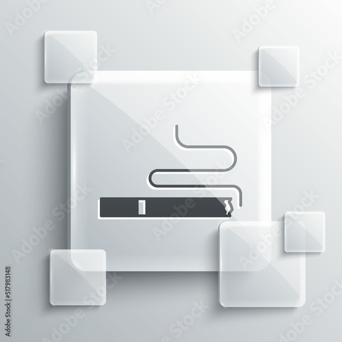 Grey Cigarette icon isolated on grey background. Tobacco sign. Smoking symbol. Square glass panels. Vector