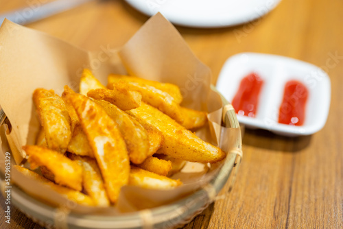 Fotografi French fries with ketchup