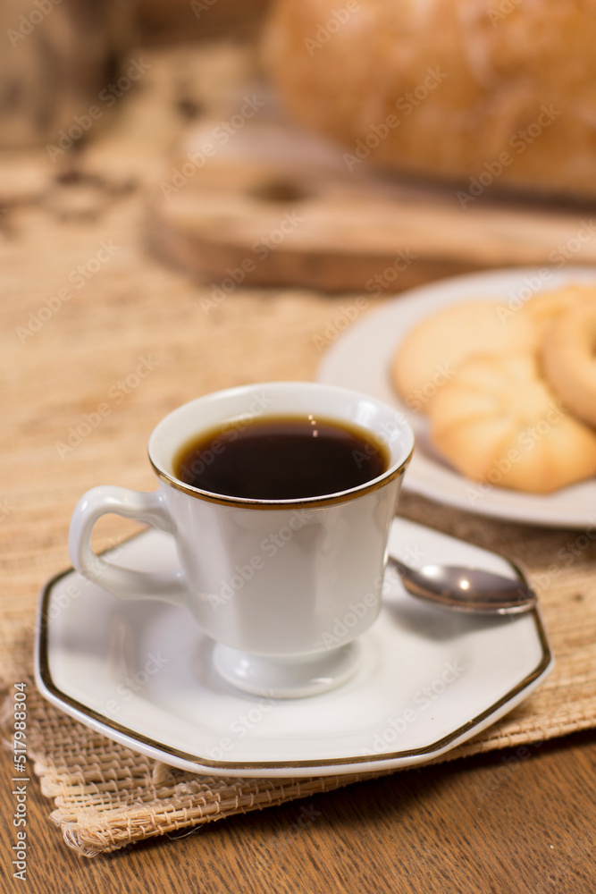 table with coffee cup and butter cookies. table with coffee cup and butter cookies.