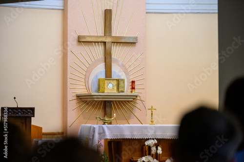 The Blessed Sacrament exposed for adoration in the adoration chapel  and people are praying in prostration. Medjugorje, Bosnia and Herzegovina. 2021-08-03.  photo