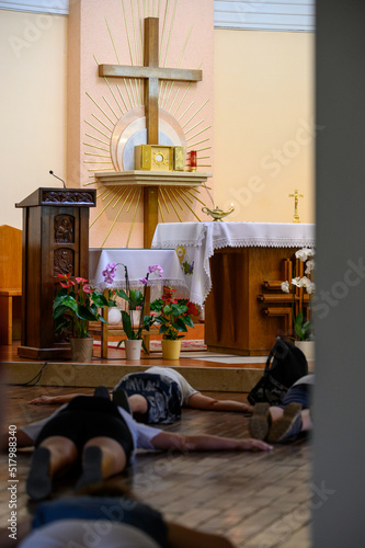 The Blessed Sacrament exposed for adoration in the adoration chapel and people are praying in prostration. Medjugorje, Bosnia and Herzegovina. 2021-08-03. 