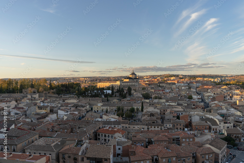 Panoramic view of the capital of Toledo, from one of the several viewpoints that have this medieval town. Photo taken on a summer day with a clear sky and at sunset.