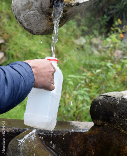 collect water in a plastic container Latin America