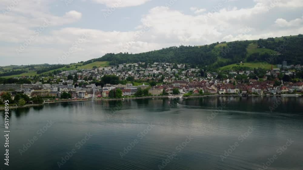 Lateral flight over City of Zug in Switzerland Lateral flight over City of Zug in Switzerland