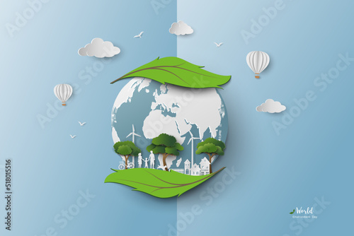Eco friendly and green energy city concept with family love nature on leaf shape abstract background