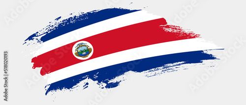National flag of Costa Rica with curve stain brush stroke effect on white background