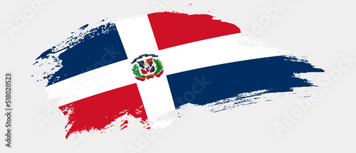 National flag of Dominican Republic with curve stain brush stroke effect on white background