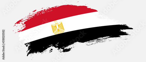 National flag of Egypt with curve stain brush stroke effect on white background