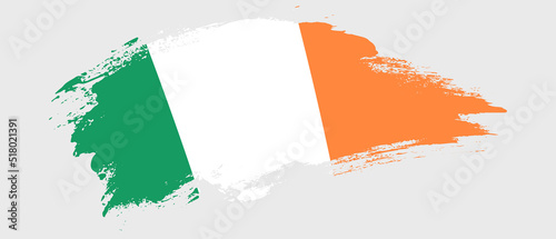National flag of Ireland with curve stain brush stroke effect on white background