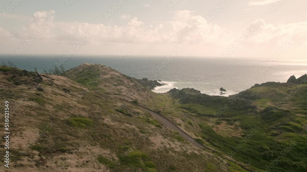 A haunting aerial floating out to the sea near Honokohau Bay in Maui, Hawaii. You can almost feel the calming warm breeze as we are about to leave the land and greet the sea.