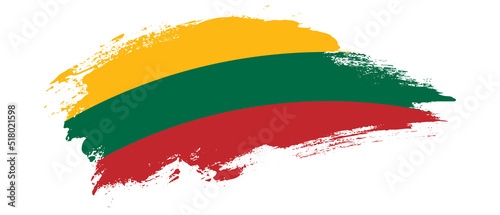 National flag of Lithuania with curve stain brush stroke effect on white background