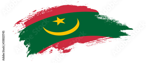 National flag of Mauritania with curve stain brush stroke effect on white background