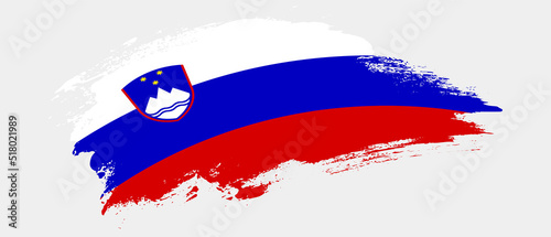 National flag of Slovenia with curve stain brush stroke effect on white background