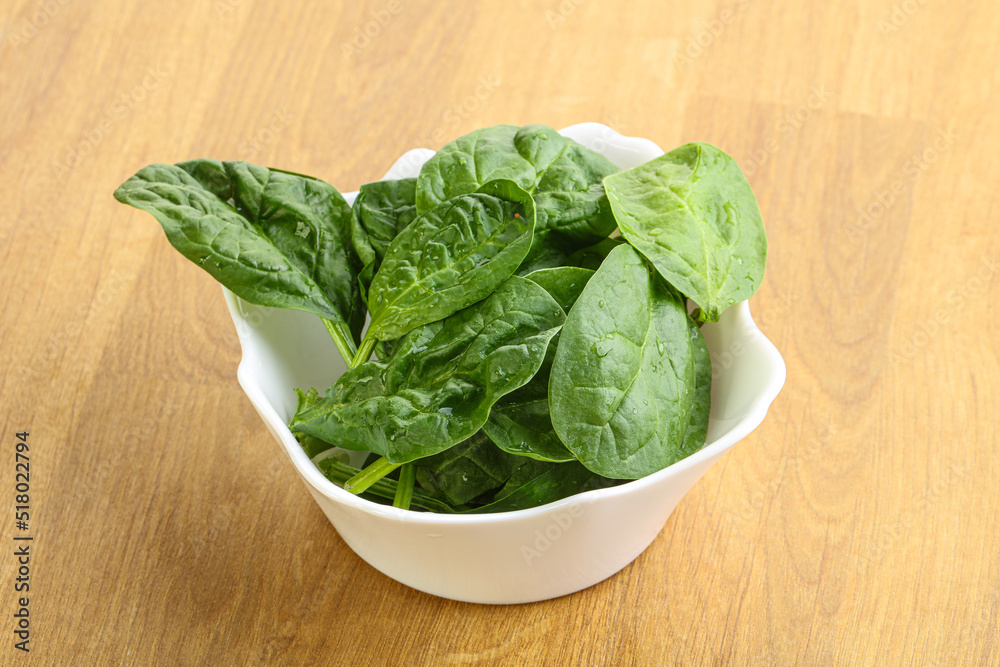 Fresh green spinach leaves in the bowl Fresh green spinach leaves in the bowl