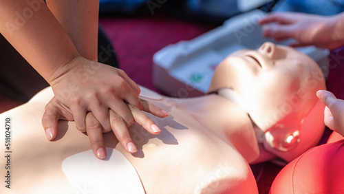 Cardiopulmonary Resuscitation, First Aid Training on a CPR Dummy.