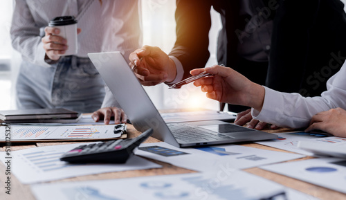 Business Team working at office with documents on his desk, doing planning analyzing the financial report, business plan investment, finance analysis concept	