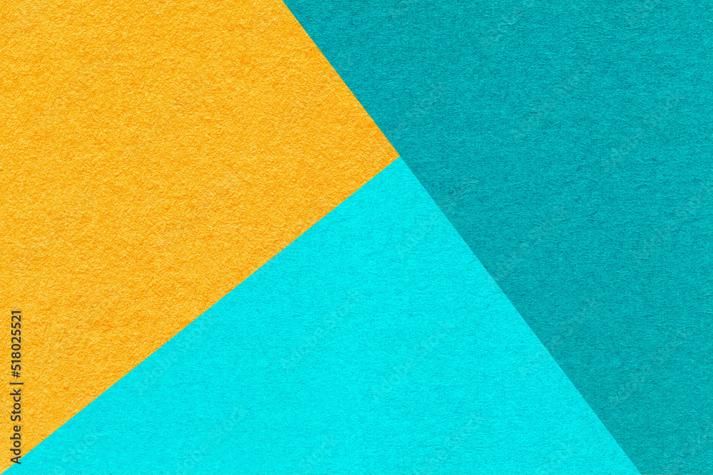 Texture of craft cyan, turquoise and orange shade color paper background, macro. Vintage abstract cardboard Texture of craft cyan, turquoise and orange shade color paper background, macro. Vintage abstract cardboard