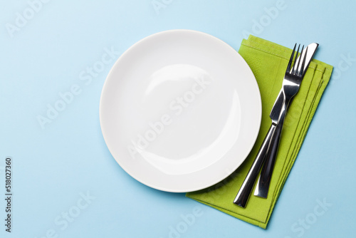 Empty plate and silverware