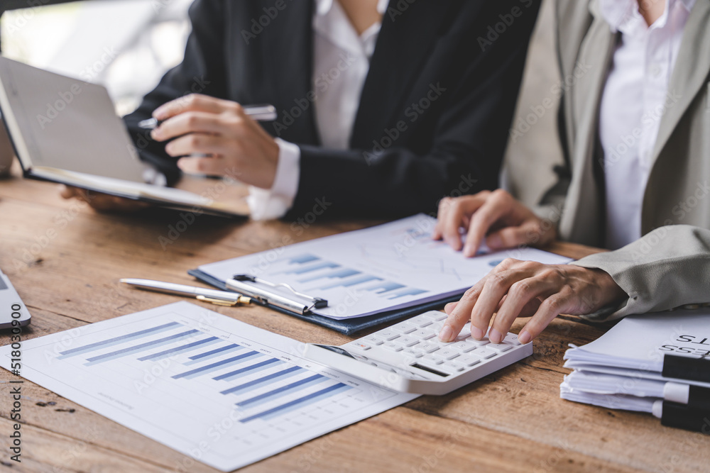 Young colleagues having great business conversations in a modern coworking office. Teamwork concept. Horizontal blurry background. Fireworks. Young colleagues having great business conversations in a modern coworking office. Teamwork concept. Horizontal blurry background. Fireworks.