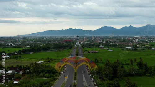 Aerial view of the city colorful Monument Tembolak Rainbow on Mataram. The newest icon from the city of Mataram Indonesia. Lombok, Indonesia photo