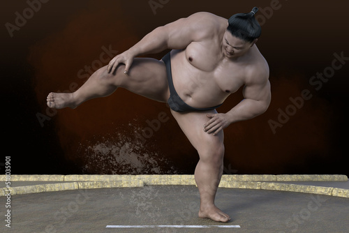 大きな体躯の力士が勝負を控え、足を上げて伝統のシコを踏んでいる photo